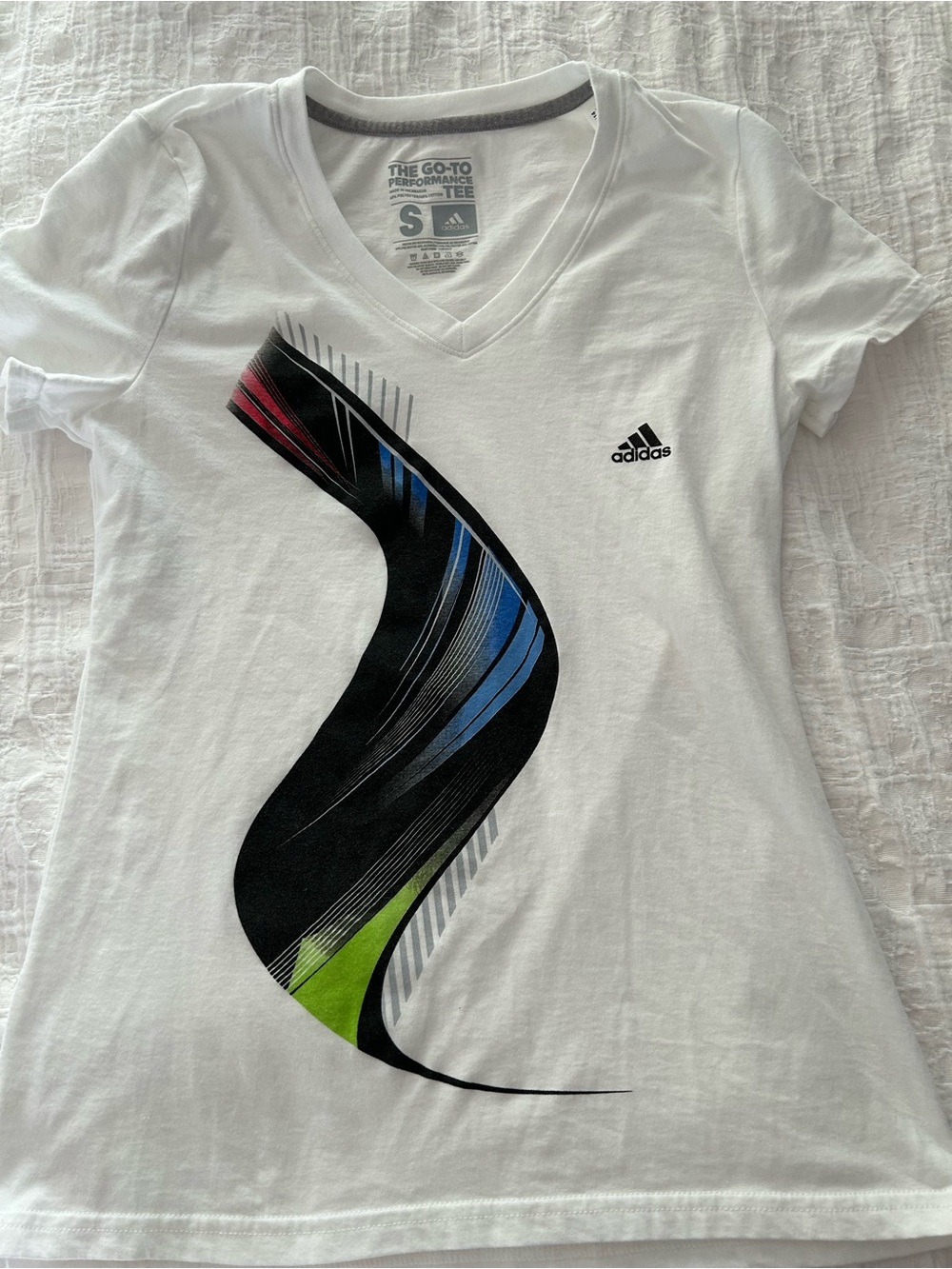 adidas White V-Neck Tee with Black, Blue, Red & Green Wave Graphic